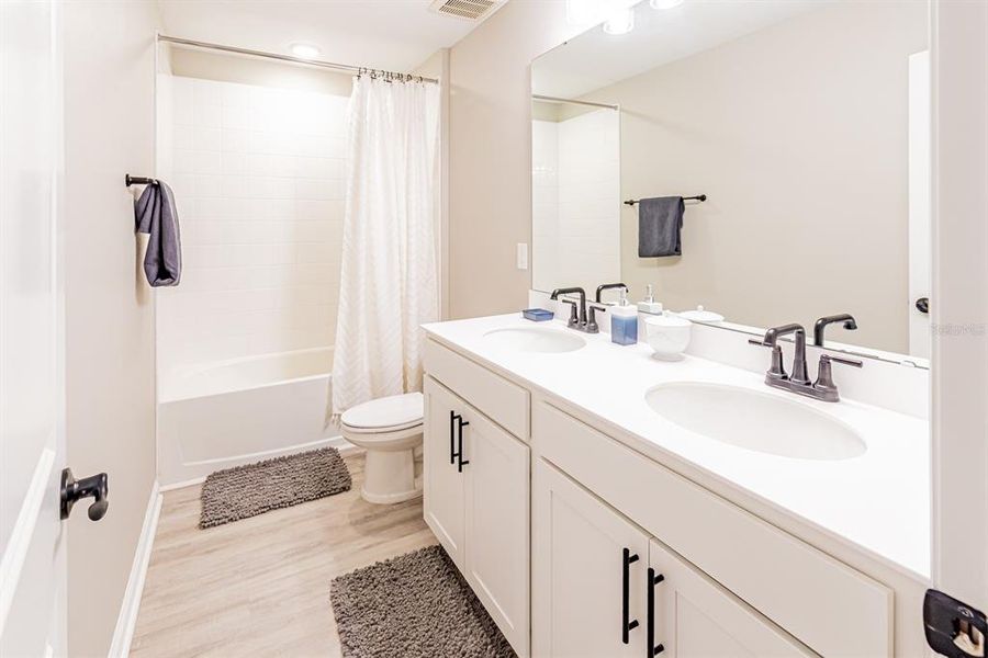 Furnished interior view inside a new home in Seasons at Lakeside Forest, Tavares (Image 14).