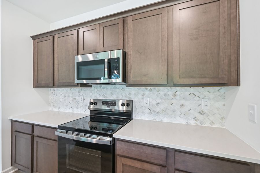 Representative furnished interior of a home built from the Meadow by Ashton Woods in Middleton Farms, Middlesex (Image 6).