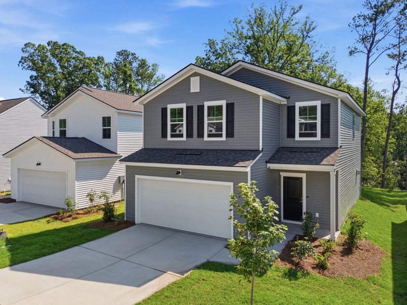 Front exterior of a new home in Grand Arbor, Blythewood, SC, highlighting curb appeal (Image 2). Front exterior of a new home in Grand Arbor, Blythewood, SC, highlighting curb appeal (Image 2).