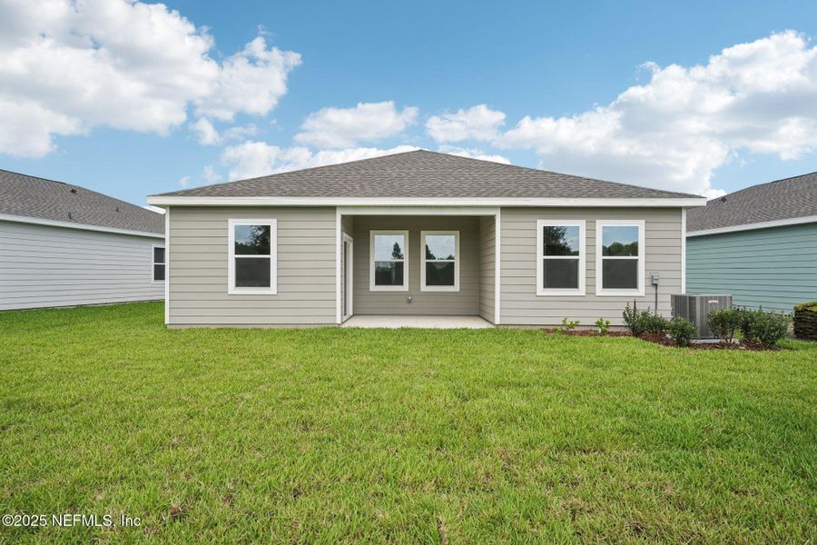 Exterior details and patio area of a home in , Palm Coast (Image 2). Exterior details and patio area of a home in , Palm Coast (Image 2).