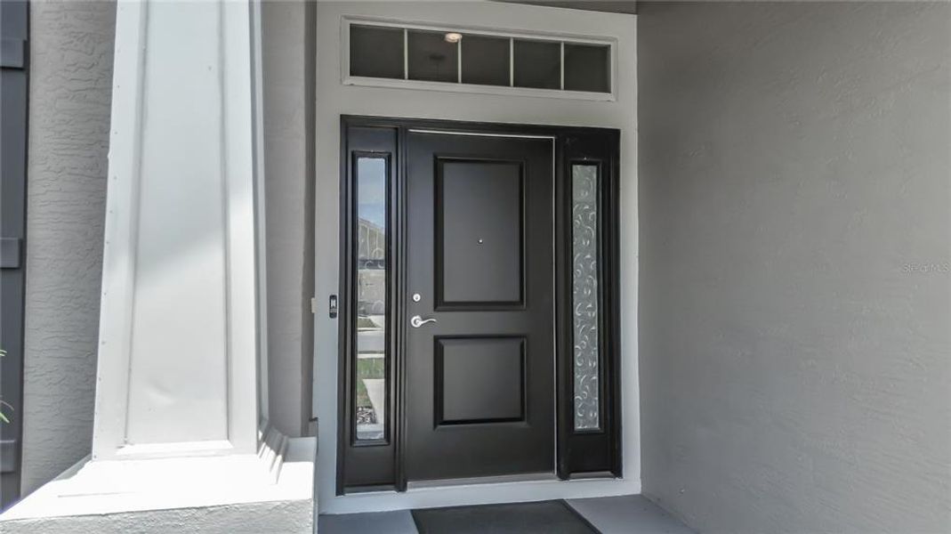 Exterior details and patio area of a home in , Spring Hill (Image 3).