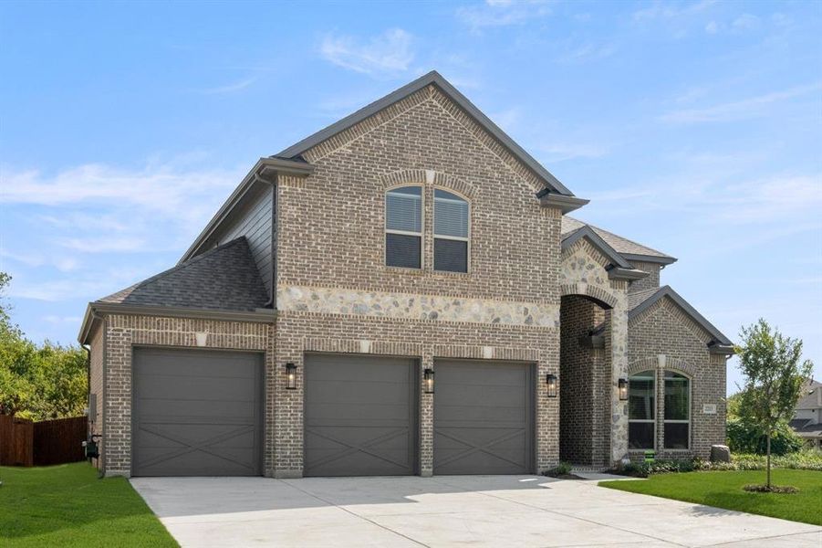 Front exterior of a new home in Birdsong, Mansfield, TX, highlighting curb appeal (Image 25).