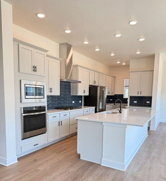 Furnished interior view inside a new home in Painted Prairie Heritage Collection, Aurora (Image 7).