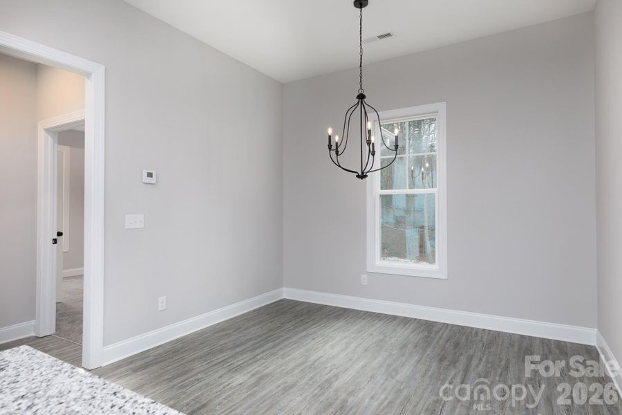 Eat-in dining area located off the kitchen. Eat-in dining area located off the kitchen.