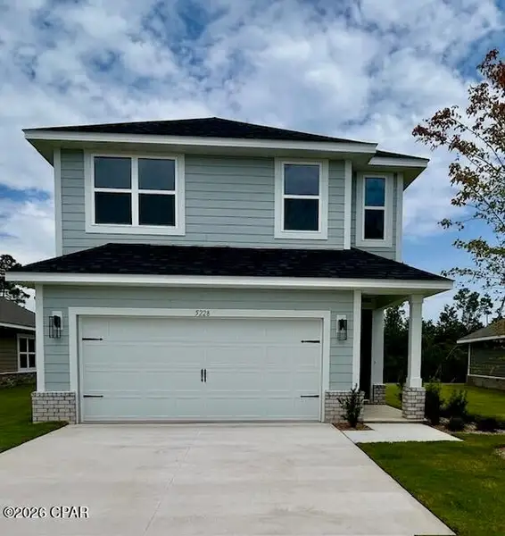 Front exterior of a new home in Parkbrook, Panama City, FL, highlighting curb appeal (Image 2). Front exterior of a new home in Parkbrook, Panama City, FL, highlighting curb appeal (Image 2).