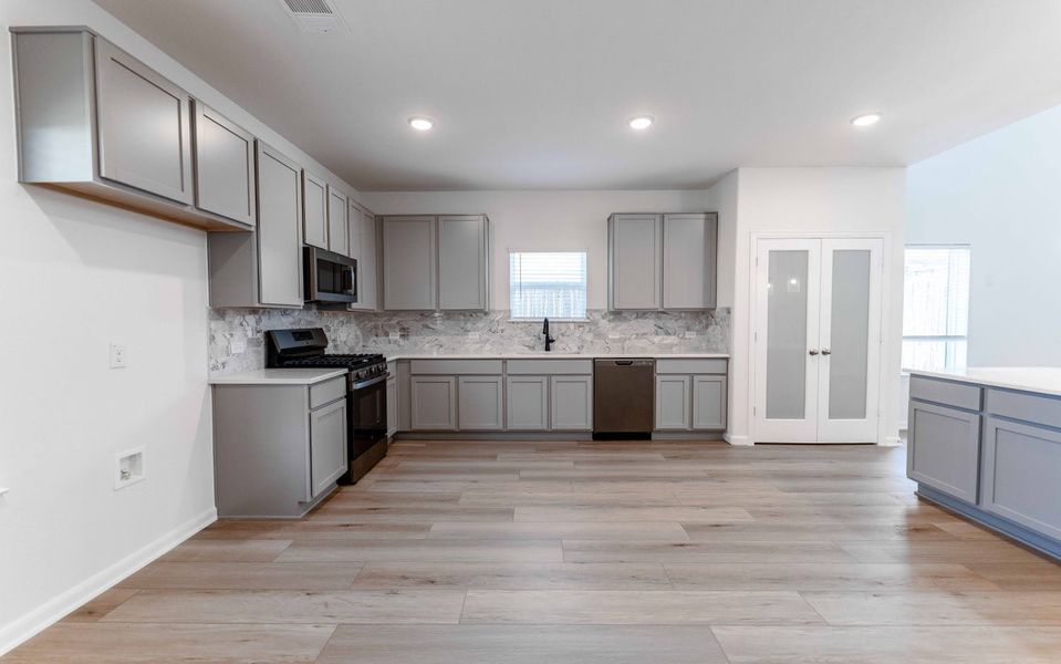 Furnished interior view inside a new home in Travis Ranch, Forney (Image 4). Furnished interior view inside a new home in Travis Ranch, Forney (Image 4).