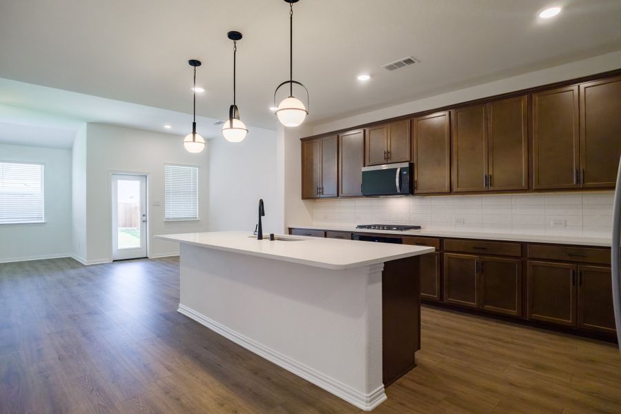 Furnished interior view inside a new home in The Villages of Hurricane Creek, Anna (Image 7).