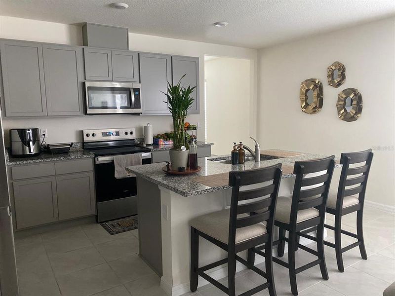 Furnished interior view inside a new home in , Ocoee (Image 9).