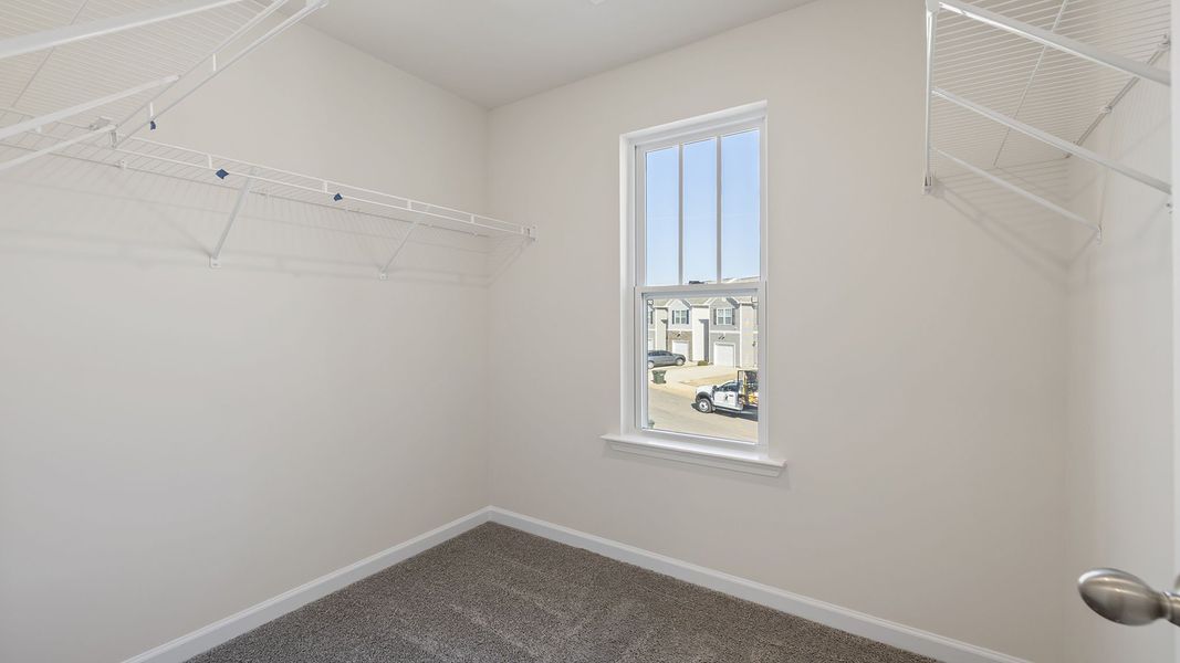 Spacious, unfurnished interior of a new home in Tanglewood Townes, Greenville (Image 26).