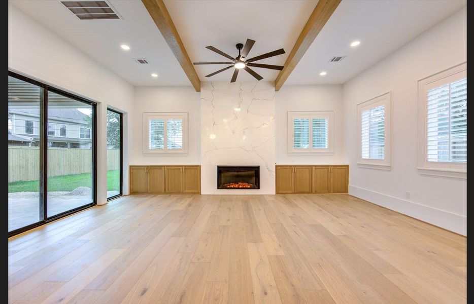 Custom window shutters already installed throughout the house.