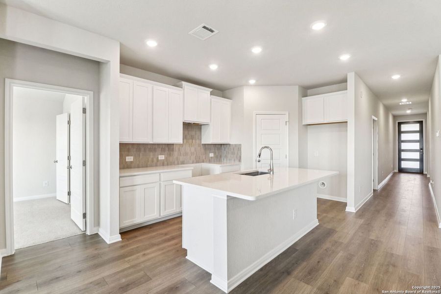 Furnished interior view inside a new home in Legendary Trails - Premier Series, Cibolo (Image 5). Furnished interior view inside a new home in Legendary Trails - Premier Series, Cibolo (Image 5).