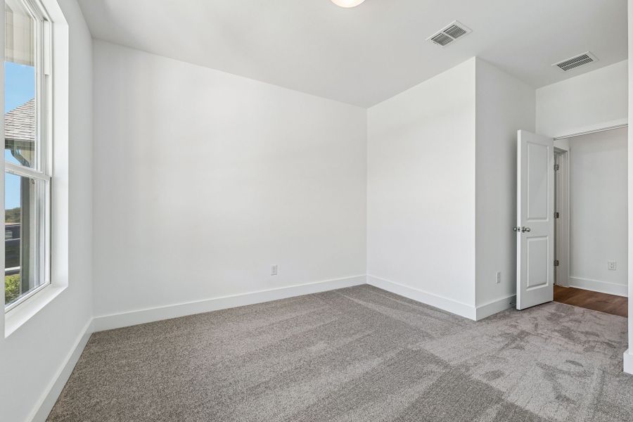 Spacious, unfurnished interior of a new home in Freedom at Anthem, Kyle (Image 23).