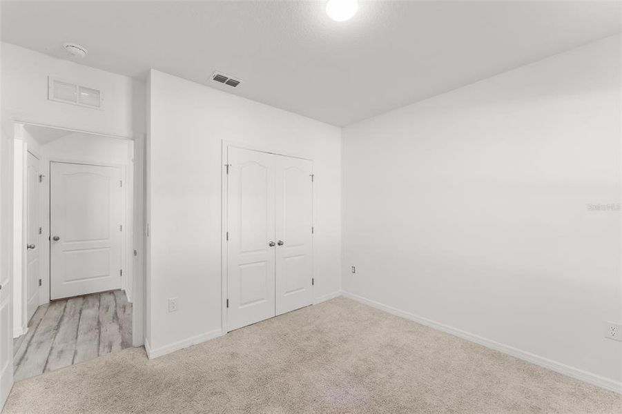 Spacious, unfurnished interior of a new home in Grace Ranch, Haines City (Image 35). Spacious, unfurnished interior of a new home in Grace Ranch, Haines City (Image 35).