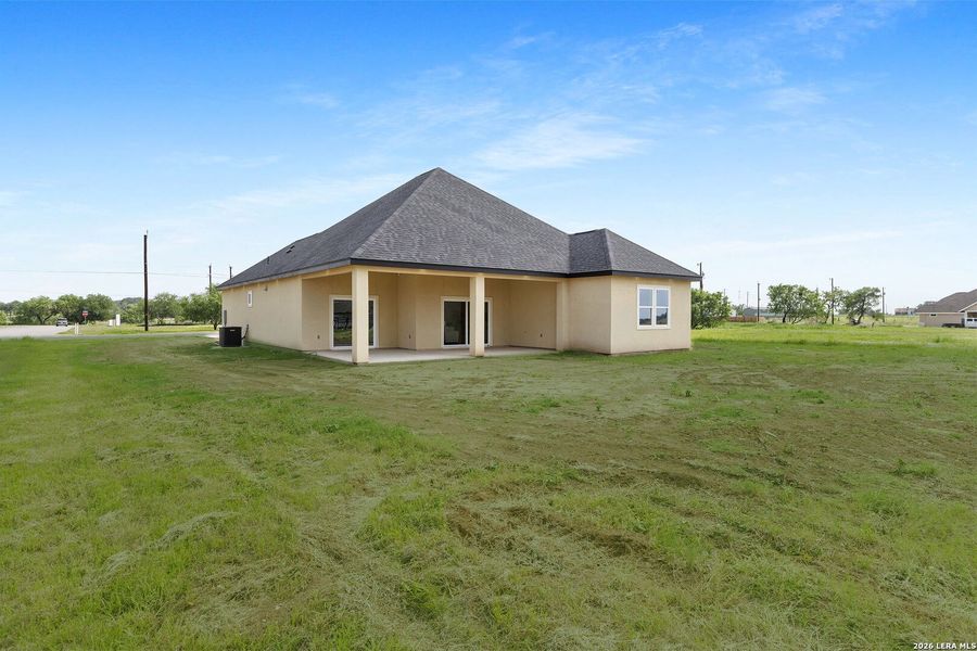 Exterior details and patio area of a home in , Atascosa (Image 33).