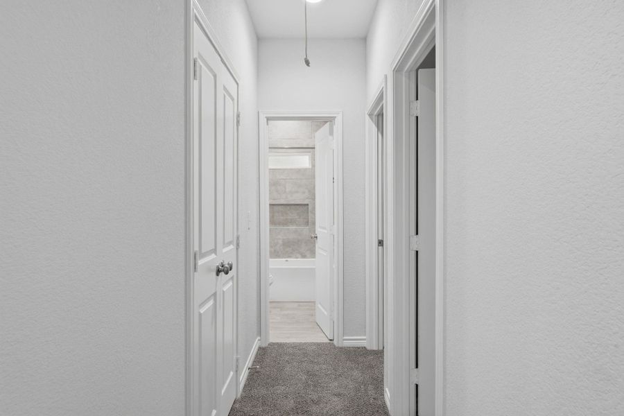 Spacious, unfurnished interior of a new home in Arrowhead Lakes, Willis (Image 32).