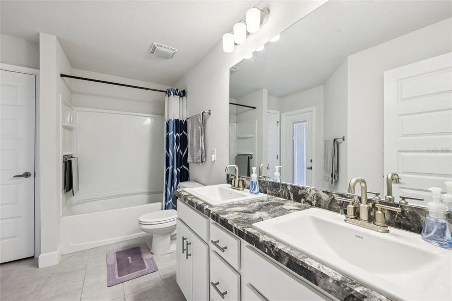 Furnished interior view inside a new home in Oaks at Ocala Crossings, Ocala (Image 18).