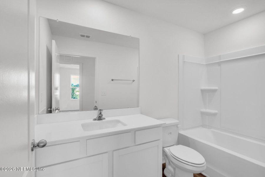 Furnished interior view inside a new home in Rolling Hills, Green Cove Springs (Image 10).