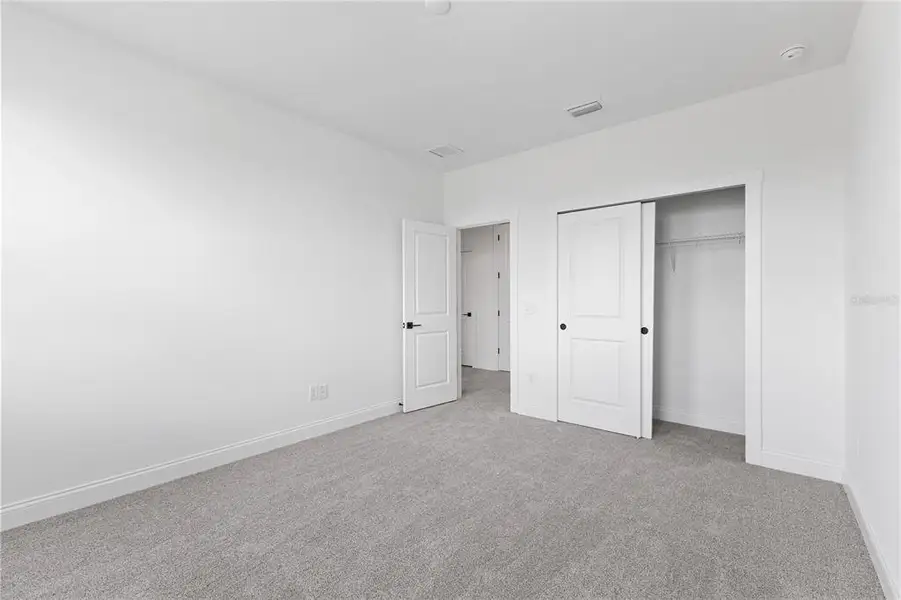 Spacious, unfurnished interior of a new home in Osprey Ranch, Winter Garden (Image 20).