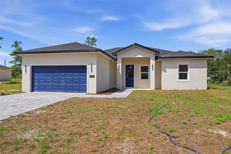 Front exterior of a new home in , Ocala, FL, highlighting curb appeal (Image 19). Front exterior of a new home in , Ocala, FL, highlighting curb appeal (Image 19).