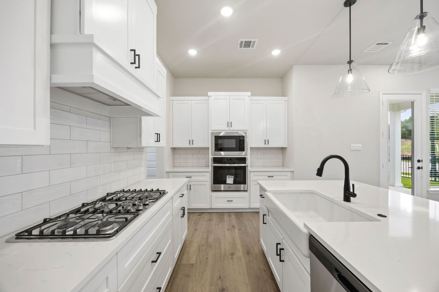 Representative furnished interior of a home built from the Peyton III by Cambridge Homes in Lake Park, Rowlett (Image 7).