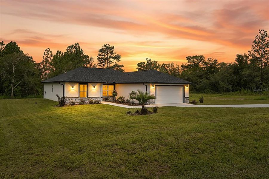 Exterior details and patio area of a home in , Brooksville (Image 3).