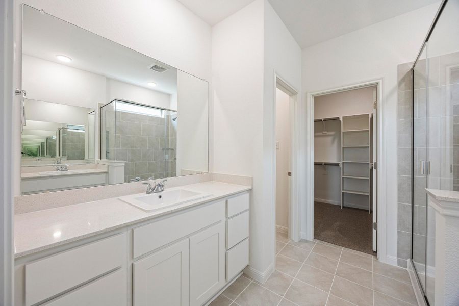 Primary Bath in the Magnolia home plan by Trophy Signature Homes – REPRESENTATIVE PHOTO