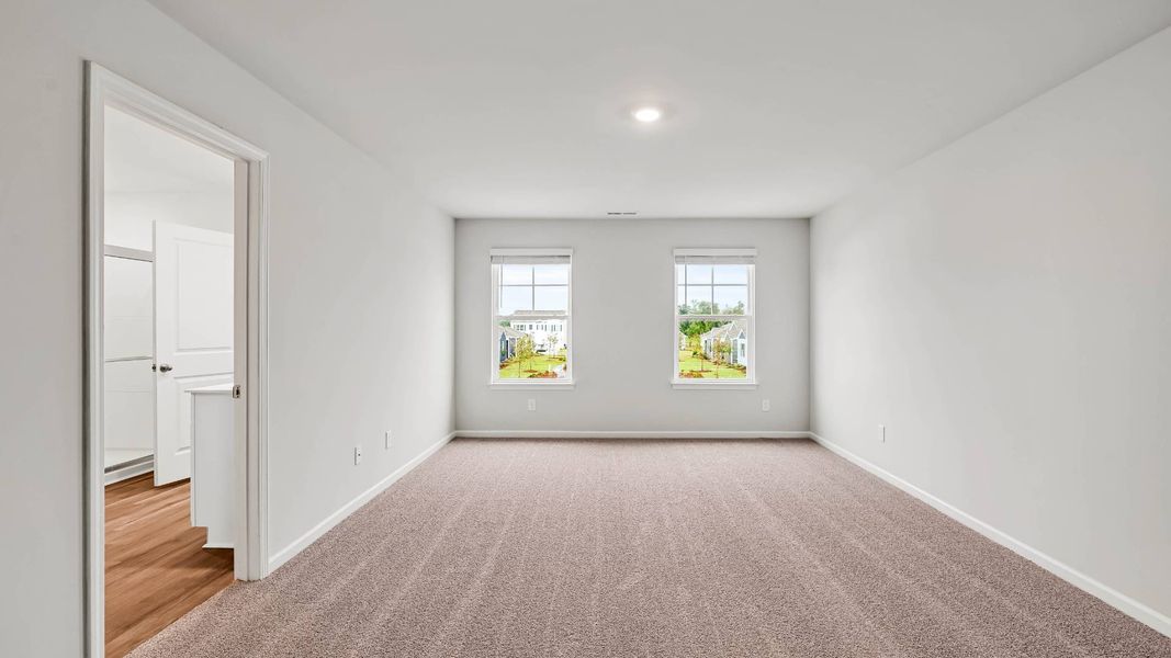 Spacious, unfurnished interior of a new home in Sidbury Station, Castle Hayne (Image 29).