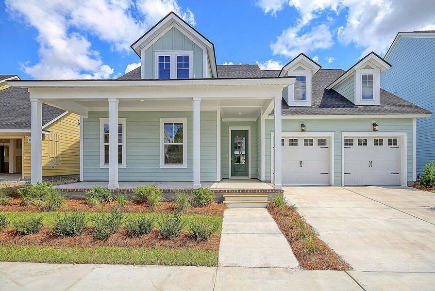 Front exterior of a new home in Nexton - Midtown - The Village Collection, Summerville, SC, highlighting curb appeal (Image 1). Front exterior of a new home in Nexton - Midtown - The Village Collection, Summerville, SC, highlighting curb appeal (Image 1).