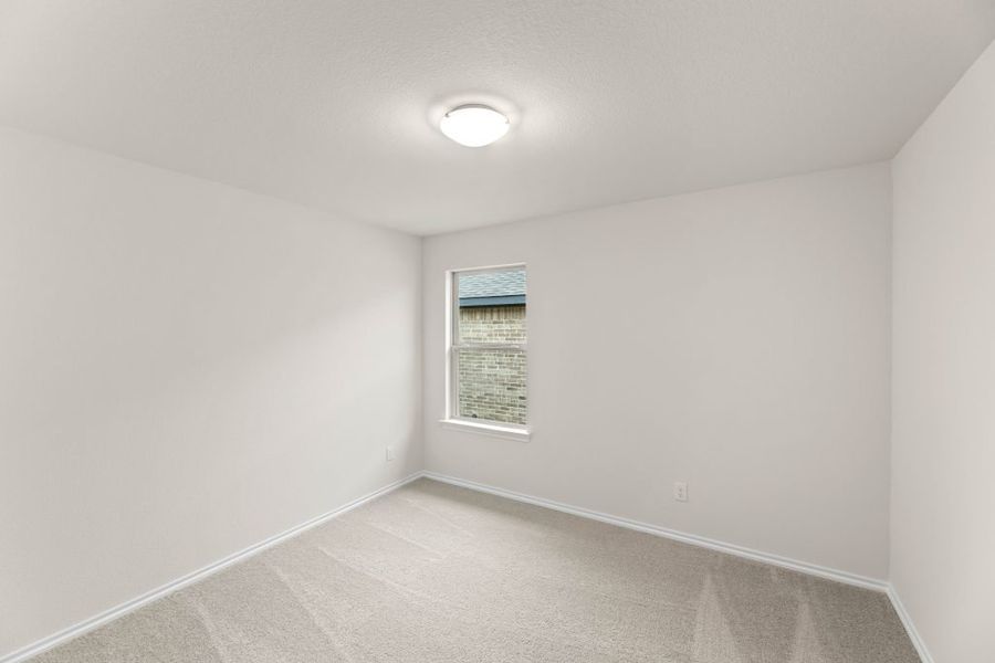 Representative exterior photo of a completed home built from the Lexington by Impression Homes in Baker Farms, Cleburne, TX (Image 23).