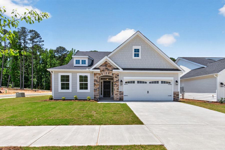 Front exterior of a new home in Highland Bluff, Aiken, SC, highlighting curb appeal (Image 1). Front exterior of a new home in Highland Bluff, Aiken, SC, highlighting curb appeal (Image 1).