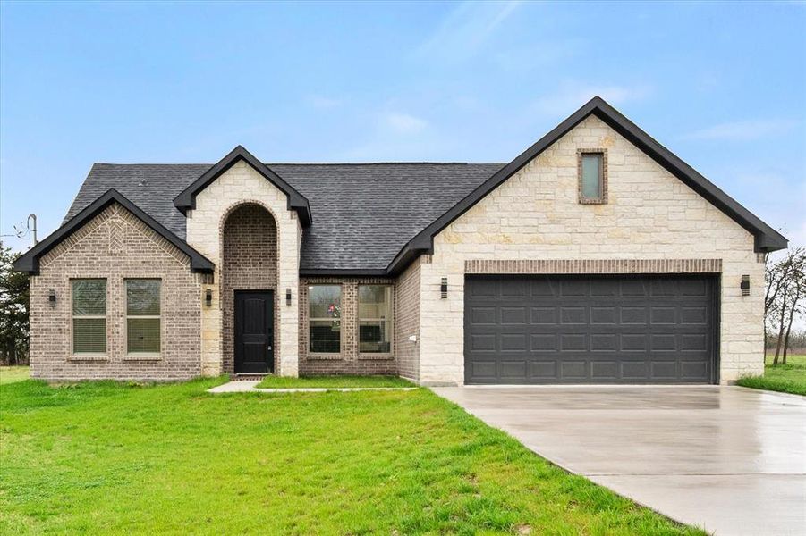 Front exterior of a new home in , Barry, TX, highlighting curb appeal (Image 25).