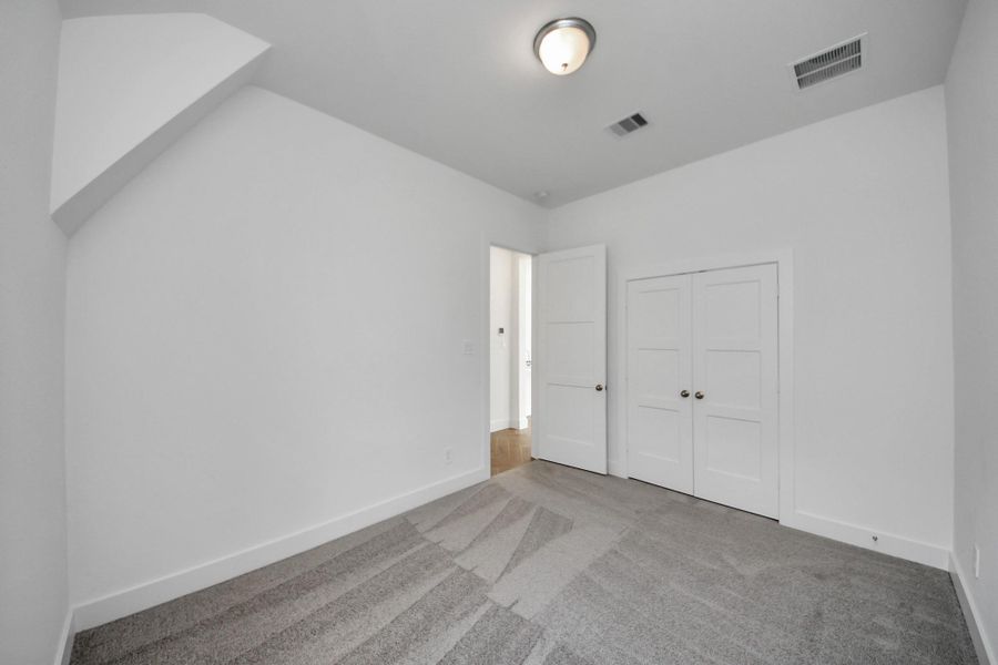 Spacious, unfurnished interior of a new home in Amira: Premier Collection, Tomball (Image 21).