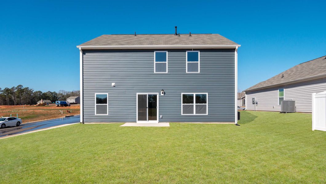 Front exterior of a new home in Brookside Farms, Greer, SC, highlighting curb appeal (Image 2).