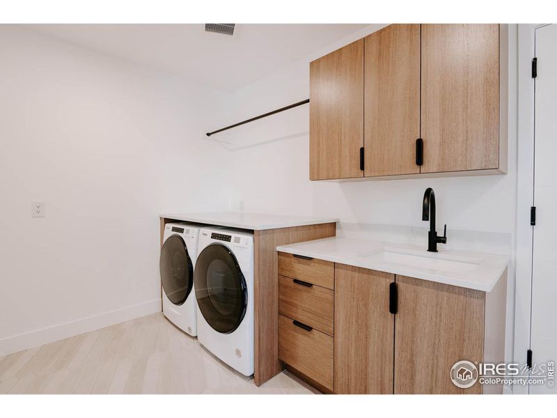 Large laundry/mudroom just off the garage