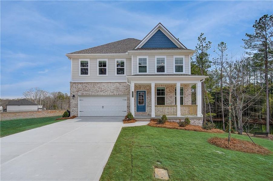 Front exterior of a new home in Hamilton Lakes, Lawrenceville, GA, highlighting curb appeal (Image 1). Front exterior of a new home in Hamilton Lakes, Lawrenceville, GA, highlighting curb appeal (Image 1).