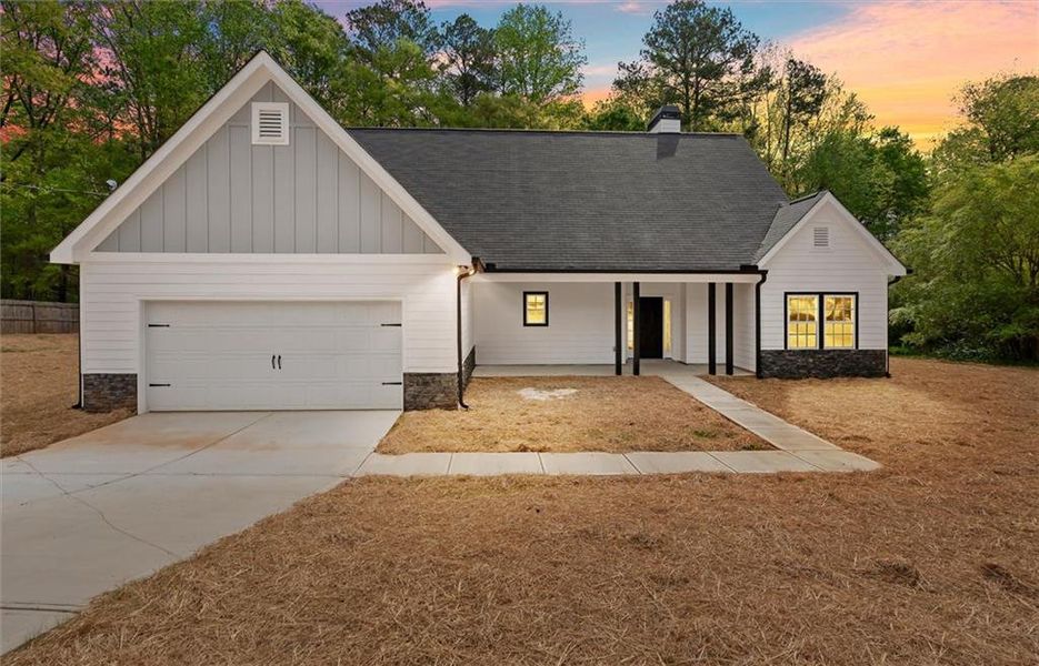 Front exterior of a new home in , Villa Rica, GA, highlighting curb appeal (Image 21).