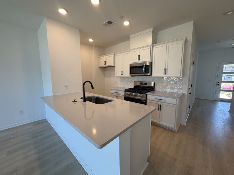 Furnished interior view inside a new home in Nexus Townhomes, Gallatin (Image 6). Furnished interior view inside a new home in Nexus Townhomes, Gallatin (Image 6).