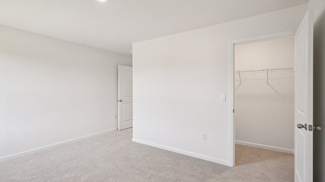 Spacious, unfurnished interior of a new home in Eagle Creek, Fuquay Varina (Image 30). Spacious, unfurnished interior of a new home in Eagle Creek, Fuquay Varina (Image 30).
