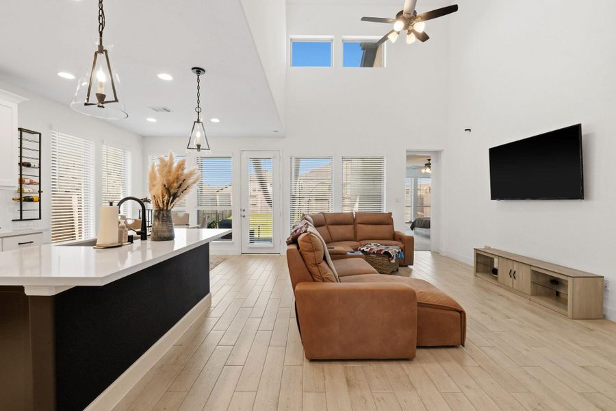 View highlighting the seamless connection between the living spaces and kitchen