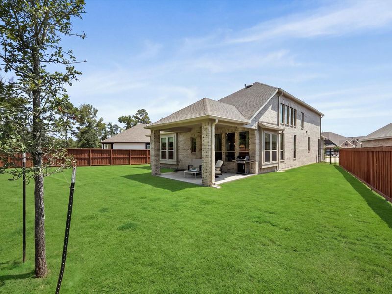 Exterior details and patio area of a home in NorthGrove, Magnolia (Image 3).