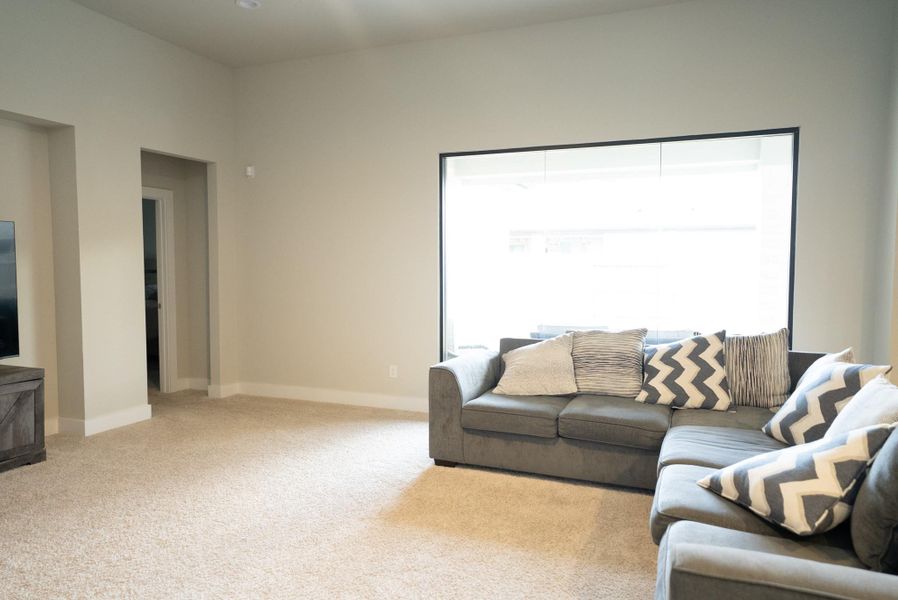 Furnished interior view inside a new home in Sunterra, Katy (Image 36).