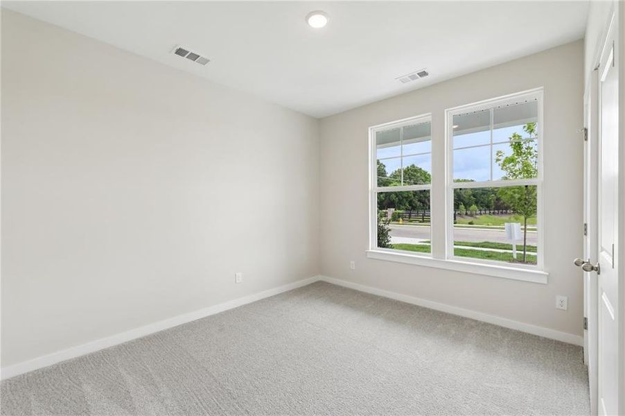 Spacious, unfurnished interior of a new home in The Park at Brighton, Locust Grove (Image 14).