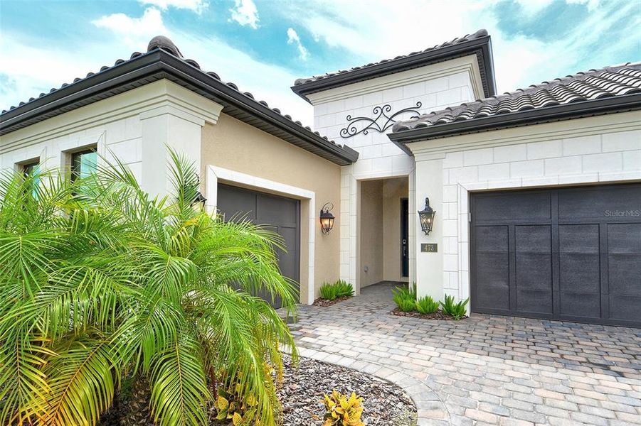 Front exterior of a new home in , Nokomis, FL, highlighting curb appeal (Image 17).