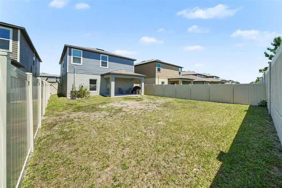 Exterior details and patio area of a home in Two Rivers, Zephyrhills (Image 4).