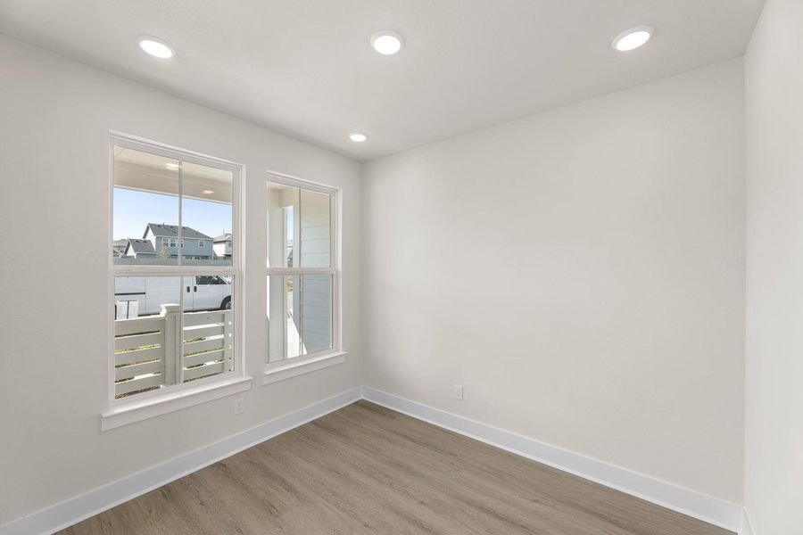 Spacious, unfurnished interior of a new home in Cottage Collection at Harvest, Argyle (Image 14).