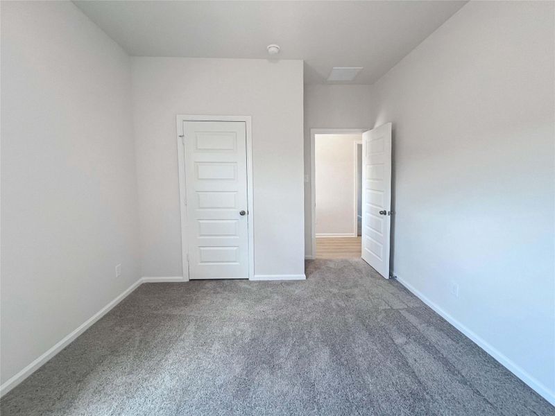 Secondary Bedroom. Home under construction. Sample floor plan photo used for illustrative purposes only. Upgrades, selections options, windows and colors may vary.