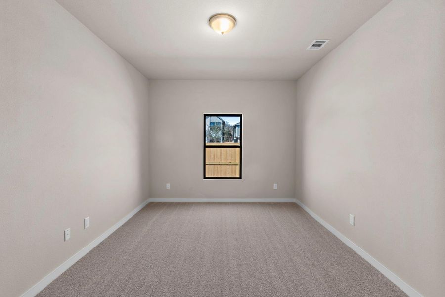 Spacious, unfurnished interior of a new home in Arabella on the Prairie 60', Richmond (Image 11).