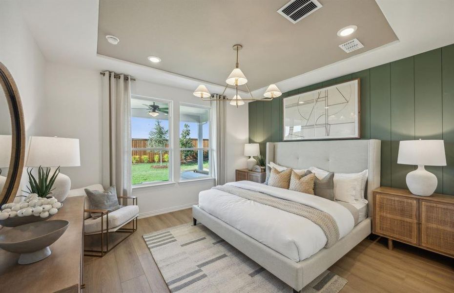 Spacious owner's suite with private bath *Model Representation*