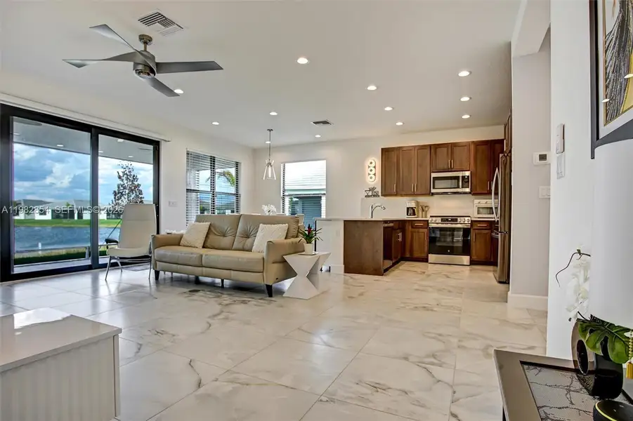 Furnished interior view inside a new home in , Port St. Lucie (Image 12).