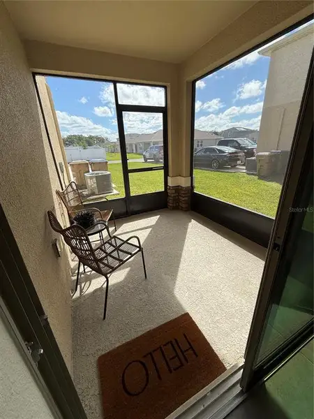 Exterior details and patio area of a home in Kindred, Kissimmee (Image 30).